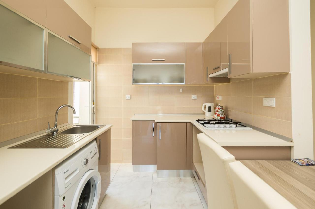 Spacious Two-Bedroom Apartment In Amazing Residence Escape Homes 凯里尼亚 外观 照片